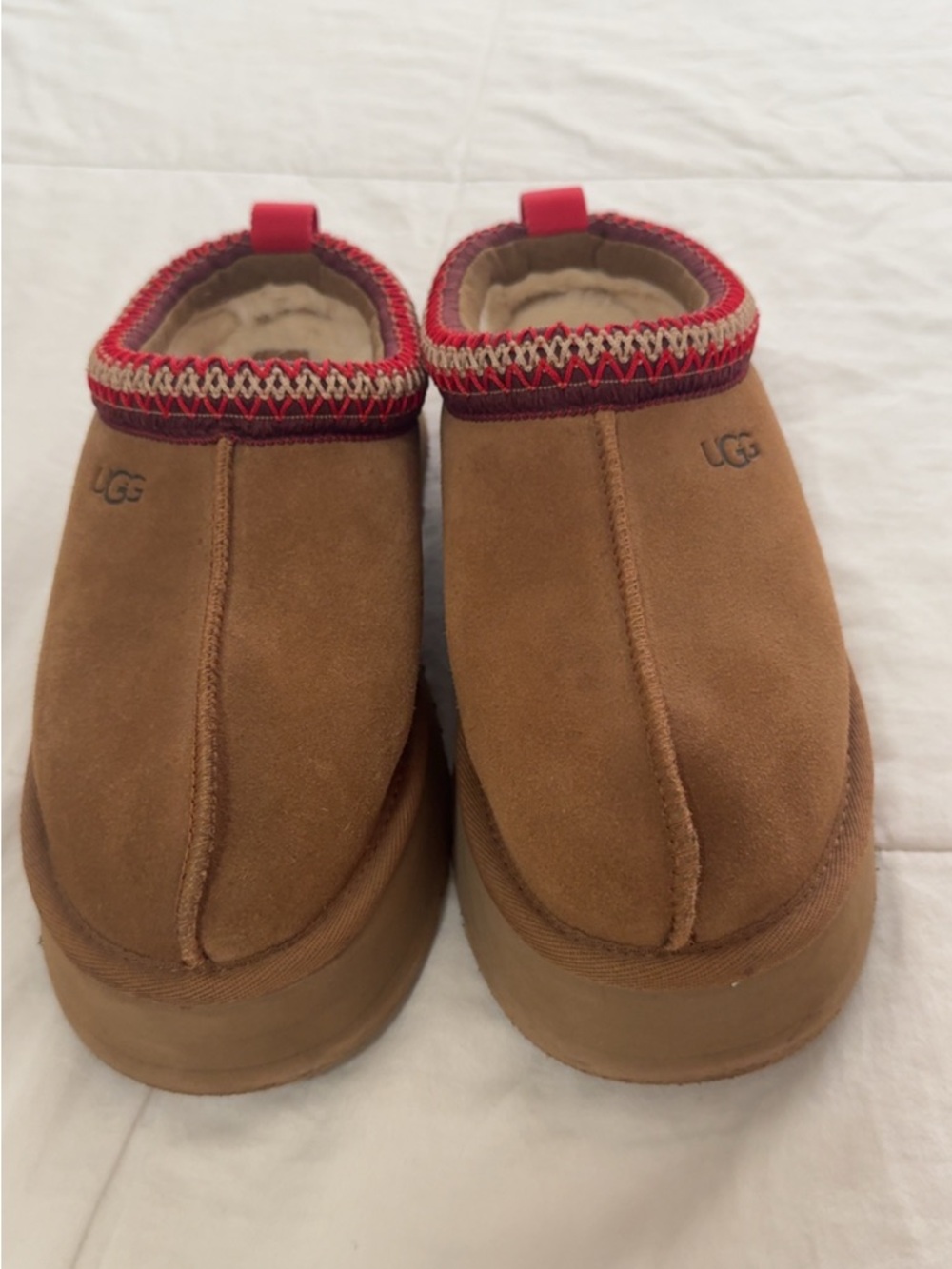 UGG Chestnut Suede Slip-Ons with Red Knit Trim